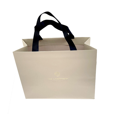 Recyclable custom pantone colored printed paper gift shopping bags with blue fabric handles